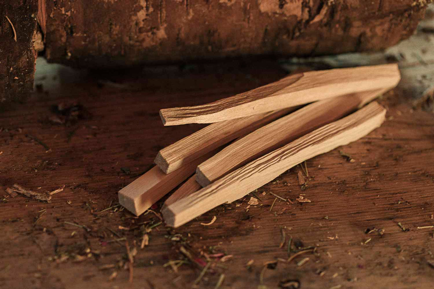 Wooden sticks on a rustic wooden surface