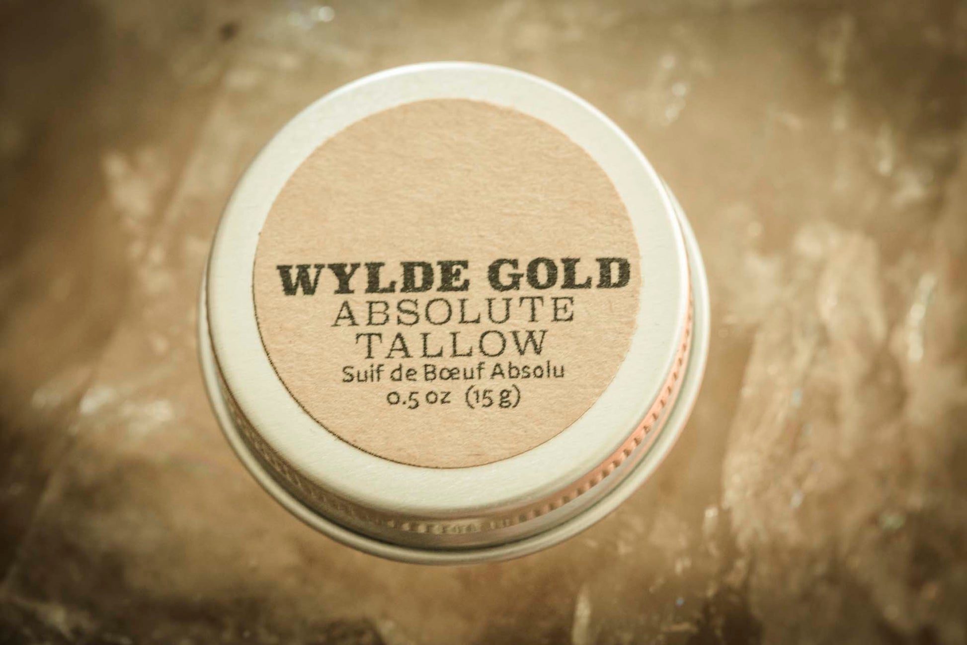 WYLDE GOLD Absolute Tallow Balm tin on smokey quartz crystal – .5 oz pure grass fed bovine tallow.